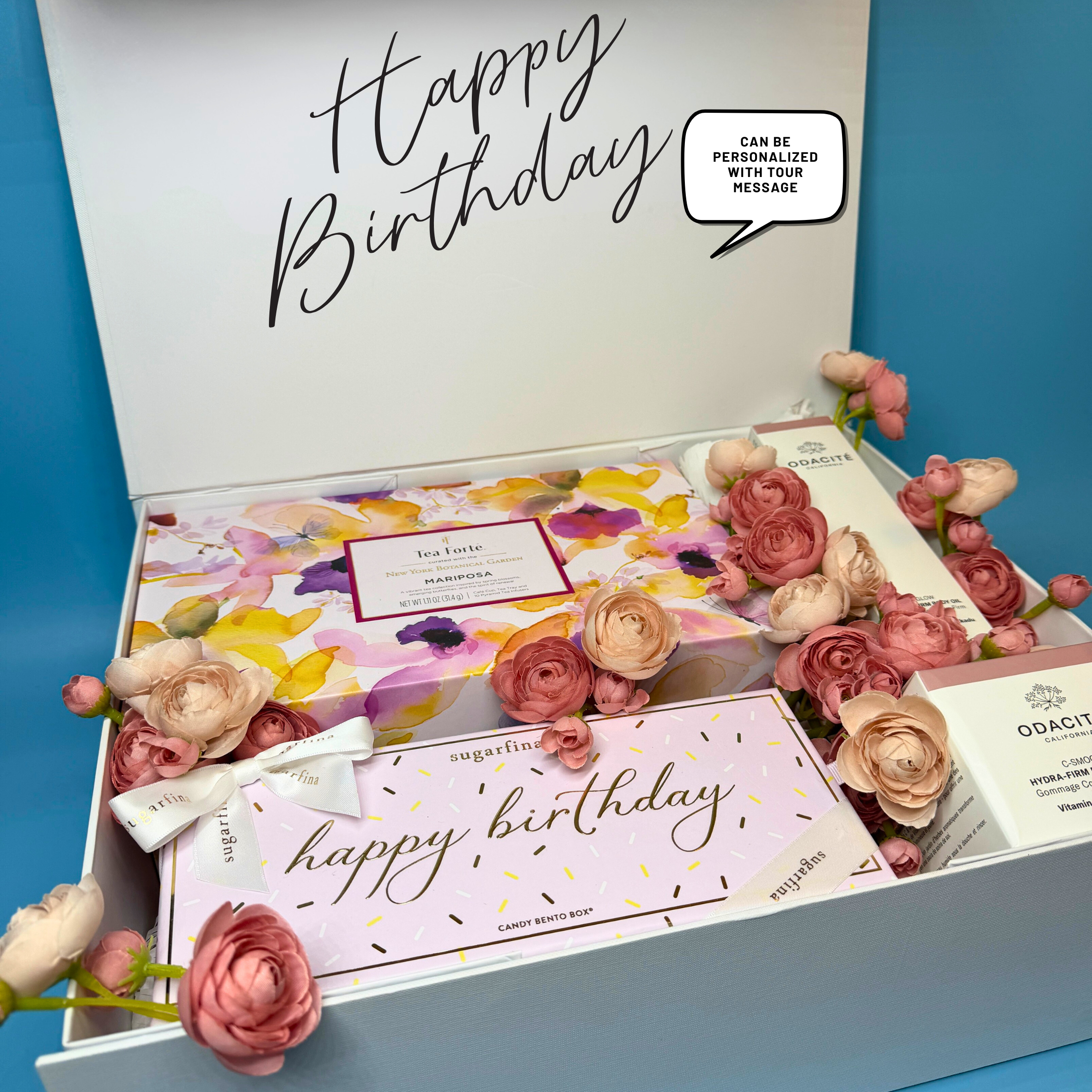 Happy birthday gift box with Tea Forte gift set, Odacite body care products and Sugarfina Happy Birthday candy set