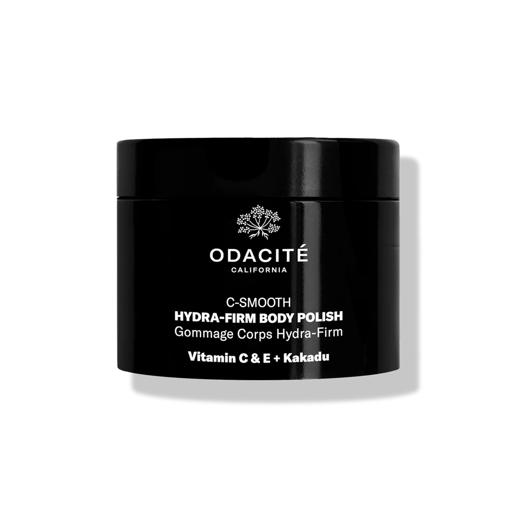 Black jar of Odacite C-Smooth Hydra-Firm Body Polish on a white background