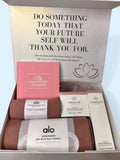 Gift set with yoga antigrip and hand , towel, and gratitude journal, Odacite body care polish and body oil in a box with motivational quote.